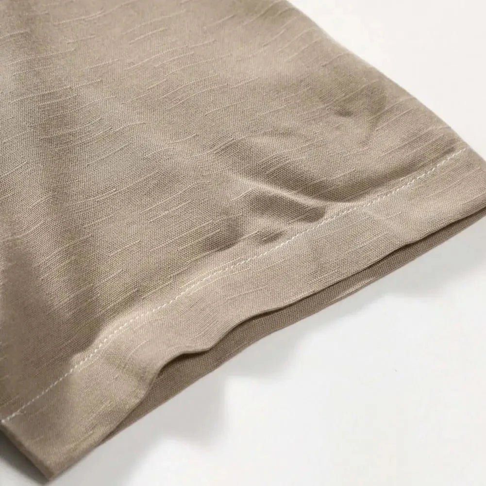 Camisa Manga Curta Lisa Borenzi BZ537 feita em tecido leve e respirável, com design minimalista e caimento ajustado que garante estilo e conforto.